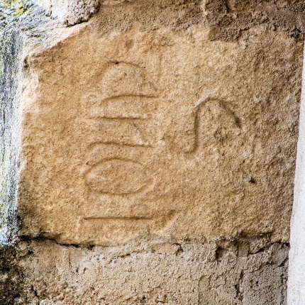 Sermon on the outer wall of the apse, probably a dedication to Saint Augustine (photoAngelo Marras)