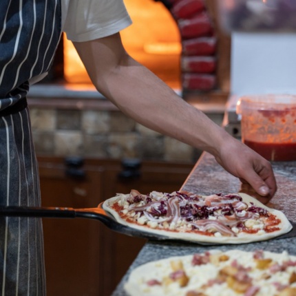 Pizza preparation (photoTripAdvisor, Pizzanu's)