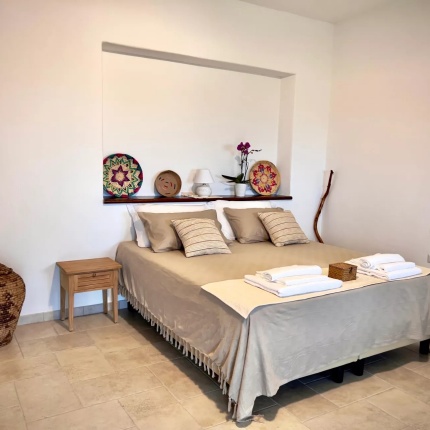 Camere da letto (foto Facebook, La Roccia Pizzeria Domus)