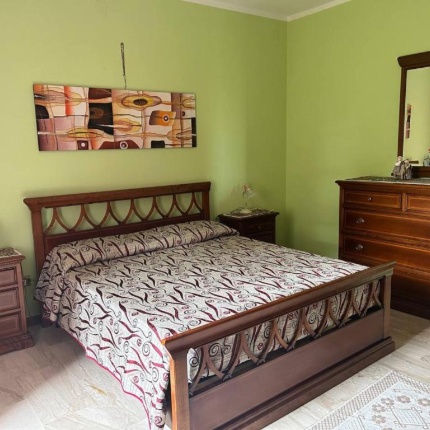 Camere da letto (foto Booking, Locanda Su Mere)